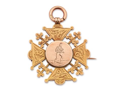 Of sporting interest: a 9ct gold medal, Millom F.C., of Maltese cross design with engraved rugby player to central boss, engr