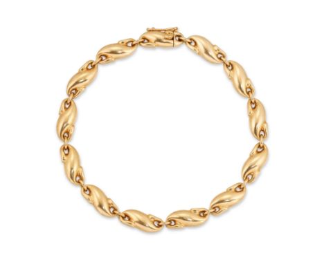 Tiffany & Co. A 18ct gold bracelet, designed by Elsa Peretti, with stylised S shaped links, to box catch, marked Tiffany & Co