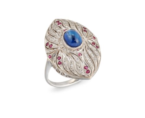 A sapphire, ruby and diamond ring,&nbsp;the oval cabochon sapphire in bezel setting to pierced marquise shaped head grain set