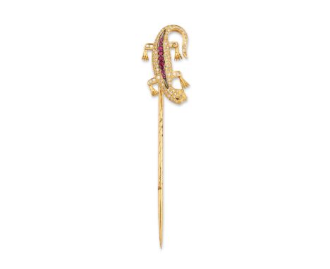 A ruby and diamond set lizard stick pin,&nbsp;the finial in the form of a lizard with ruby and brilliant cut diamond set body