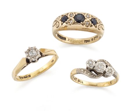 Three gold rings, comprising: a diamond single stone ring, ring size K; a diamond three stone ring, of crossover design, ring