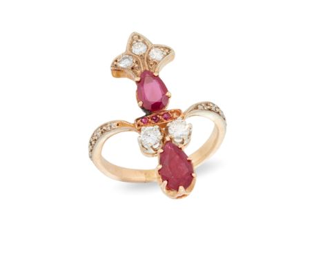 A French ruby and diamond fingerline ring,&nbsp;two pear cut rubies with a pair of brilliant cut diamonds between, and a bril