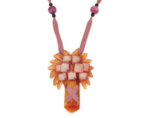 Elizabeth Bont&eacute;. A pressed stained horn pendant necklace, modelled as a palm tree on braided cord necklace with gradua