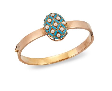 A gold enamel, half pearl and diamond bangle,&nbsp;the oval centrepiece set with half pearls to a blue enamel ground with ros