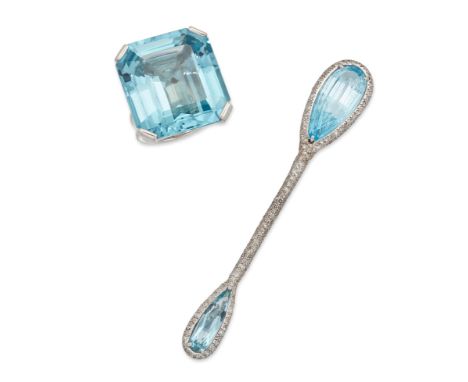 A blue topaz ring and bar brooch, the ring with a rectangular step cut blue topaz, approximately 26 x 24mm, claw set to a pla