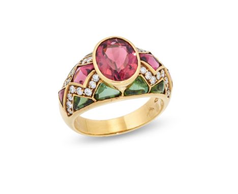 A tourmaline and diamond ring, with a bezel set oval mixed cut pink tourmaline, to tapering shoulders set with brilliant cut 