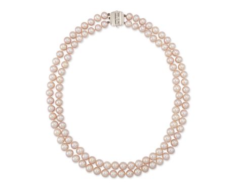 A cultured pearl necklace with diamond clasp, in the form of a double row of uniform pinkish cream cultured pearls, to a sadd