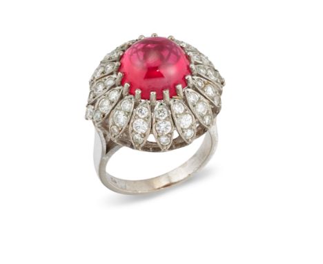 A synthetic ruby and diamond ring,&nbsp;the round cabochon synthetic ruby within brilliant cut diamond set foliate bomb&eacut