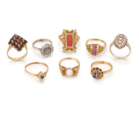 A group of eight assorted rings, including a ruby cluster ring; a diamond and sapphire cluster ring, (one stone deficient); a