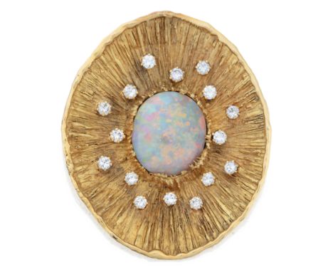 An opal and diamond brooch/pendant, possibly John Donald, with an oval cabochon opal, approximately 19.0 x 16.5mm, to oval te