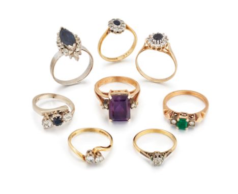 A group of eight diamond and gem rings,  comprising: a sapphire and diamond marquise cluster ring; a sapphire and diamond thr