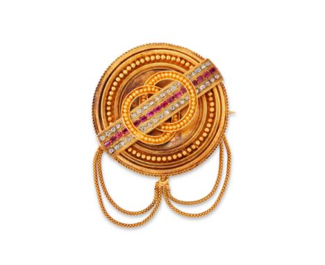 A Victorian gold ruby and diamond brooch,&nbsp;the circular shield form brooch with pellet and twisted wire decoration and ap