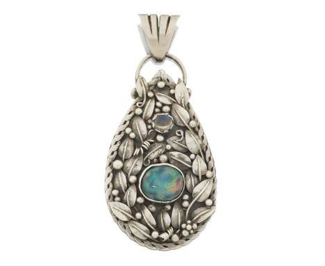 An Arts & Crafts silver opal and moonstone pendant, the pear shaped pendant with a collet set cabochon opal and moonstone, to
