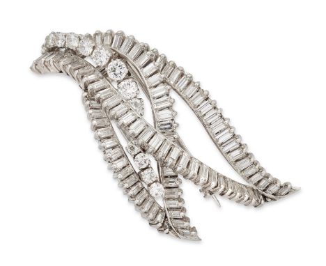 Boucheron. A diamond clip brooch, of stylised leaf design set with four intertwined lines of baguette diamonds, and a central