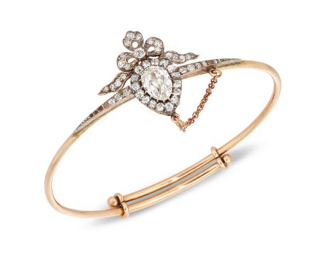 A Victorian diamond bangle/brooch, the silver mounted cut down set central old-brilliant pear-cut diamond and diamond heart c
