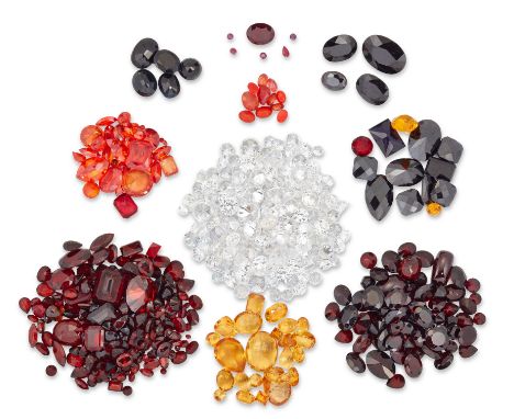 A group of unmounted facetted gemstones,&nbsp;to include garnets, citrine, smoky quartz, blue/black sapphires, orange sapphir