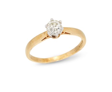 An 18ct gold single stone diamond ring, the brilliant cut diamond in white gold claw setting to yellow hoop, London hallmarks