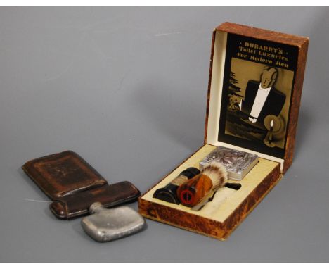 A 1930s gents Dubarry's luxury toilet set for modern men to include shaving soap, shaving brush, boxed, together with two emb