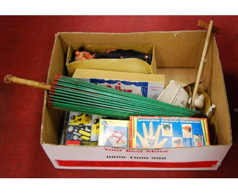 A box of miscellaneous items to include a Pelham skeleton puppet, boxed wooden finger puppets, boxed Lego Technics etc