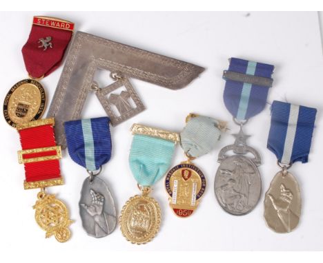 A collection of masonic gilt metal and enamel jewels, with ribbons etc