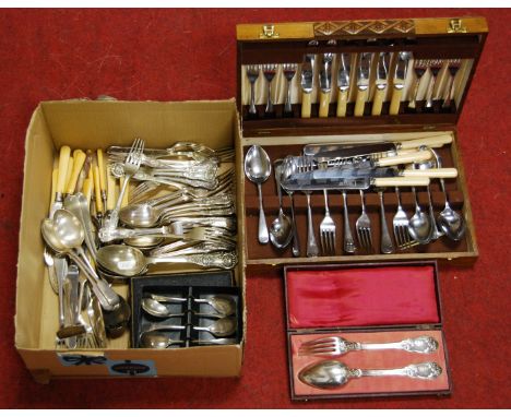 A circa 1900 French silver fork and spoon set in the Art Nouveau style, having relief decorated terminals, initialled to the 