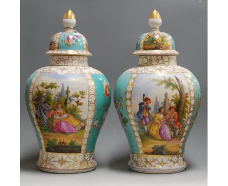 A pair of late 19th century Dresden porcelain vases and covers, each panel decorated with alternating reserves of courtship s