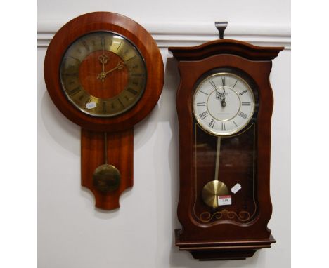 A modern Actim Westminster Chime wall clock having an enamel dial with Roman numerals, together with one other modern wall cl