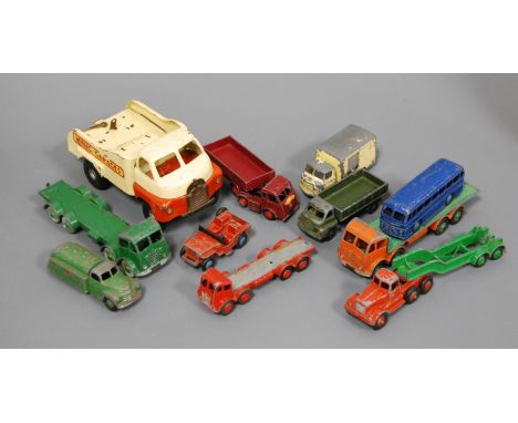 A collection of loose and playworn diecast and tinplate toy vehicles to include Triang Minic tinplate mini garages flatbed tr