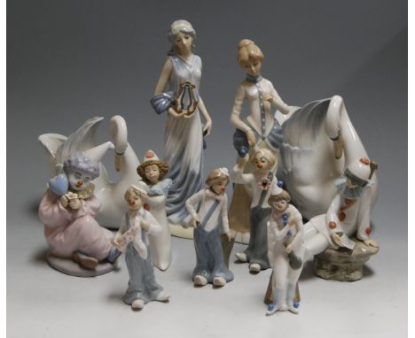 A box of assorted Spanish porcelain figures, to include pair of Nao swan vases, various clowns etc