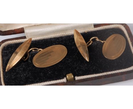 A cased pair of gent's engine turned 9ct gold cufflinks, 4.7g