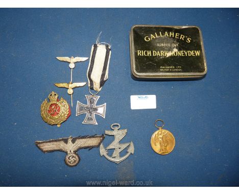 A small quantity of Medals including a 1957 replacement issue Iron Cross 2nd class, with ribbon in Prussia colours, a campaig