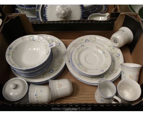 A quantity of stoneware dinner and tea ware including dinner and side plates, mugs, sugar bowl, milk jug, saucers and bowls, 