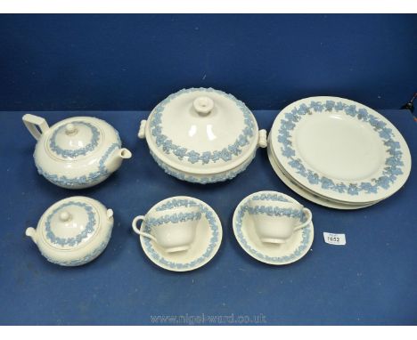 A quantity of Wedgwood embossed Queensware items in lilac on white including teapot, sugar bowl, cups , saucers, tureen and d