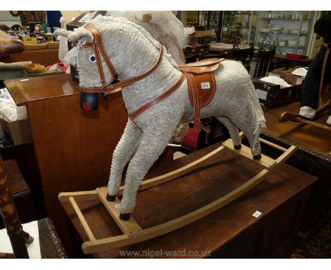 A white rocking horse