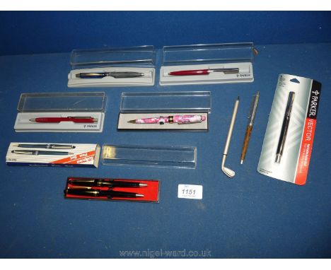 A quantity of Parker Biros and a new Parker Vector refillable Roller Ball.