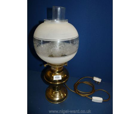 A brass Oil Lamp converted to electric with etched and frosted glass shade, 19'' tall overall.