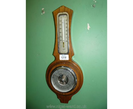 A Barometer/thermometer, 16" tall.