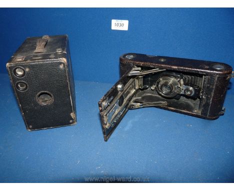 A Kodak camera no. 1A Jr C 1915 and a vintage box Camera.