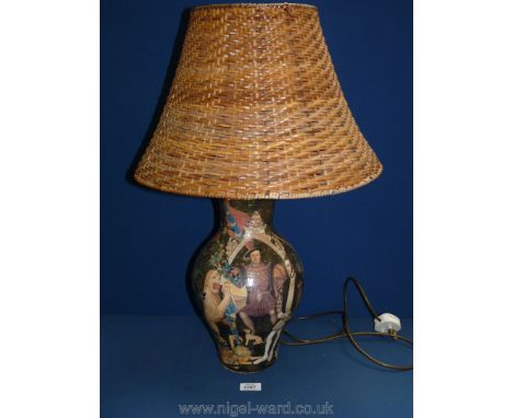 A tall ceramic table lamp with decoupage of Henry VIII, and a lion with wicker shade. 23" high without shade.