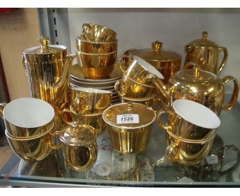 A quantity of Royal Worcester gold lustre tea and coffee ware including tea and coffee pots, cups, saucers, sugar bowl etc.