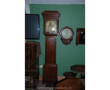 A "Geo.e Eveleigh, Beaminfter" Oak cased Longcase Clock having 8 day movement striking the hours on a bell, the polished 12" 