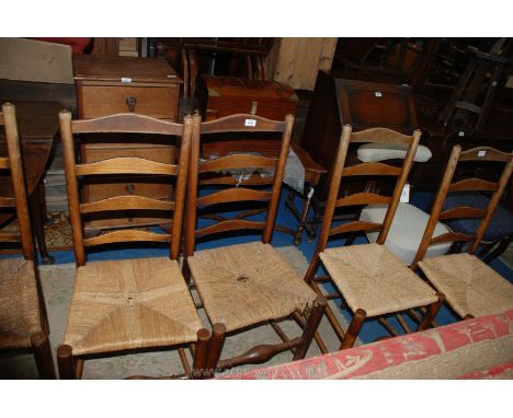 A set of five elegant ladder-back, sea-grass seated Dining Chairs having turned front legs and bulbous turned front stretcher