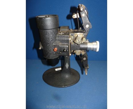 A Bell &amp; Howell Filmo 57 model 16mm 110v film projector with Taylor &amp; Hobson, circa 1934, 15'' tall.