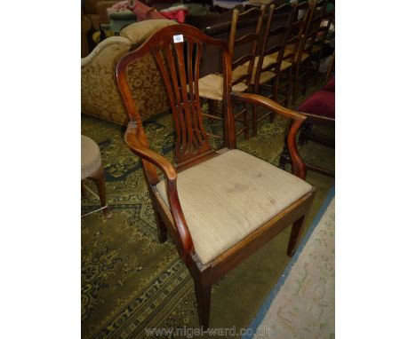 A 19th c. Mahogany framed Commode Chair having pierced/fretworked back splat, open arms, standing on tapering square front le