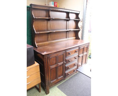 Large Ercol Dark Dresser with panelled doors 