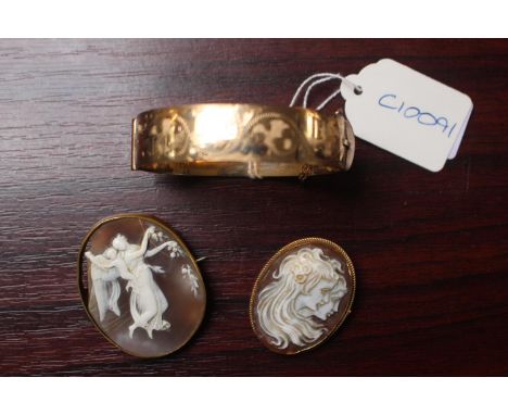 2 Carved Cameos with 9ct gold settings and a 9ct Gold plated Bangle 