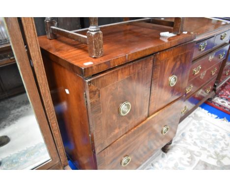 A 19th Century Regency design mahogany and rosewood commode, converted to drinks cabinet