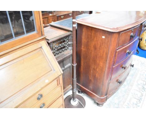A traditional mahogany standard lamp