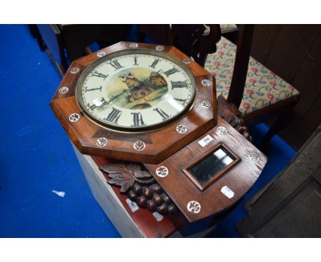 A 19th Century wall clock having painted dial depciting windmills with sail movement.
Case in good condition and with moving 