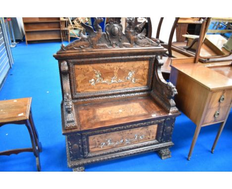 A mid to late 19th Century Northern Italian (lombardy) carved fruitwood and marquetry inlaid Cassapanca or box seat. The carv